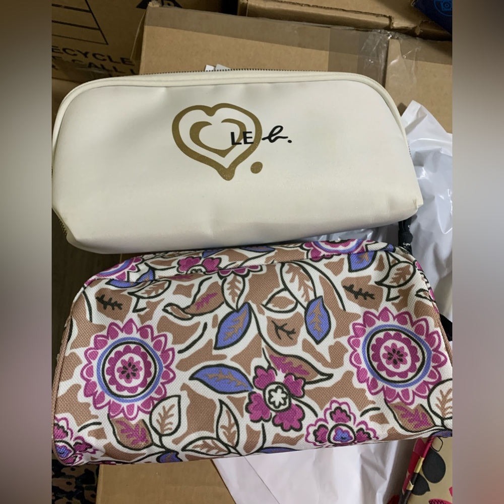 Two functional makeup bags Estee Lauder and Agnes b.
